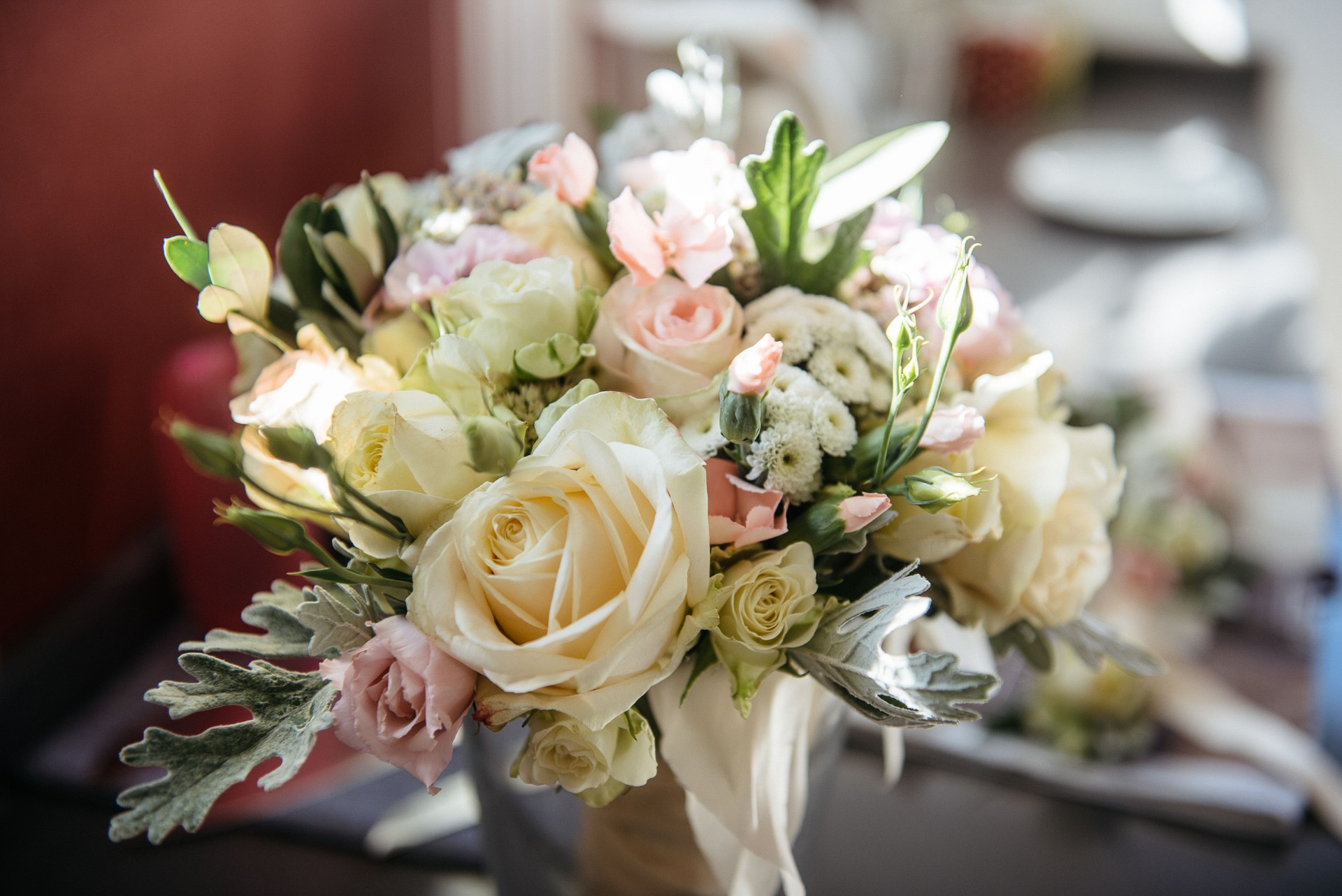 Elegant Wedding Bouquet with White and Pink Roses and Dusty Miller Leaves